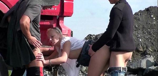 trendsConstruction site public gangbang threesome sex orgy with a cute blonde teen girl with nice perky tits and 2 hung guys with big dicks shoving their cocks in her mouth deep throat blowjob action and vaginal intercourse facking her young tight wet pussy